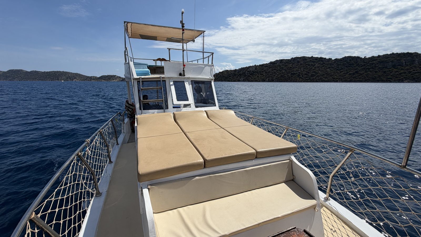 The upper deck and wheelhouse of KemalEv2 under way on the Kekova strait